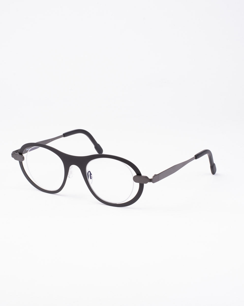 black metal oval eyeglasses by Theo model Macron, front view, lunettes de vue ovale couleur Noir