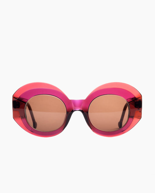 pink plastic round sunglassesby Marie-Sophie Dion model Gingues, front view, lunettes de vue rond couleur rose