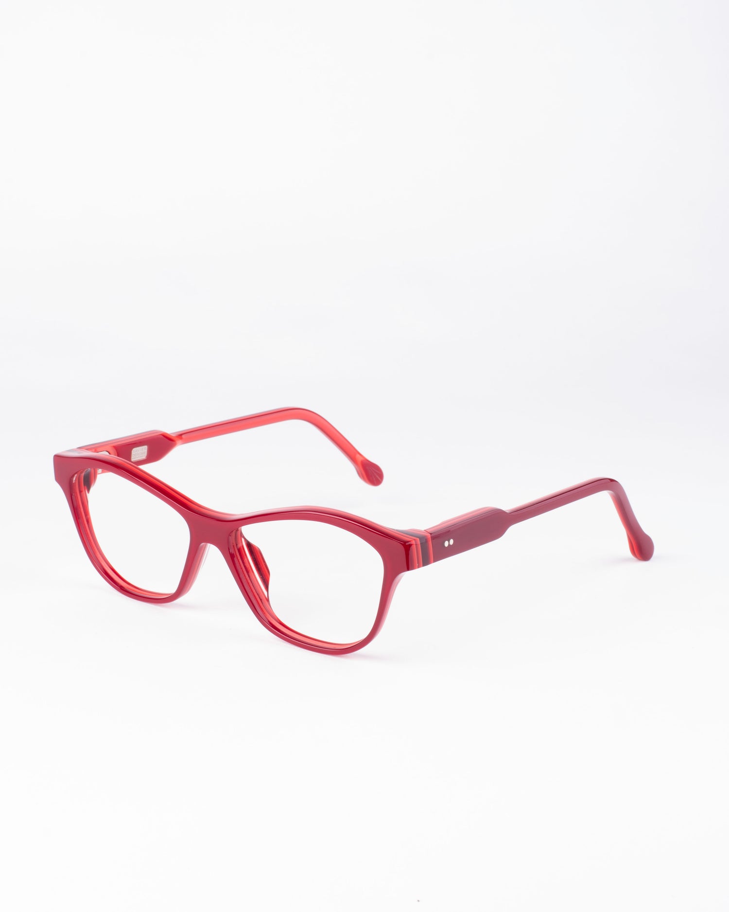 red plastic butterfly eyeglasses by Xavier Derome model Ivresse11S, front view, lunettes de vue papillon couleur Rouge