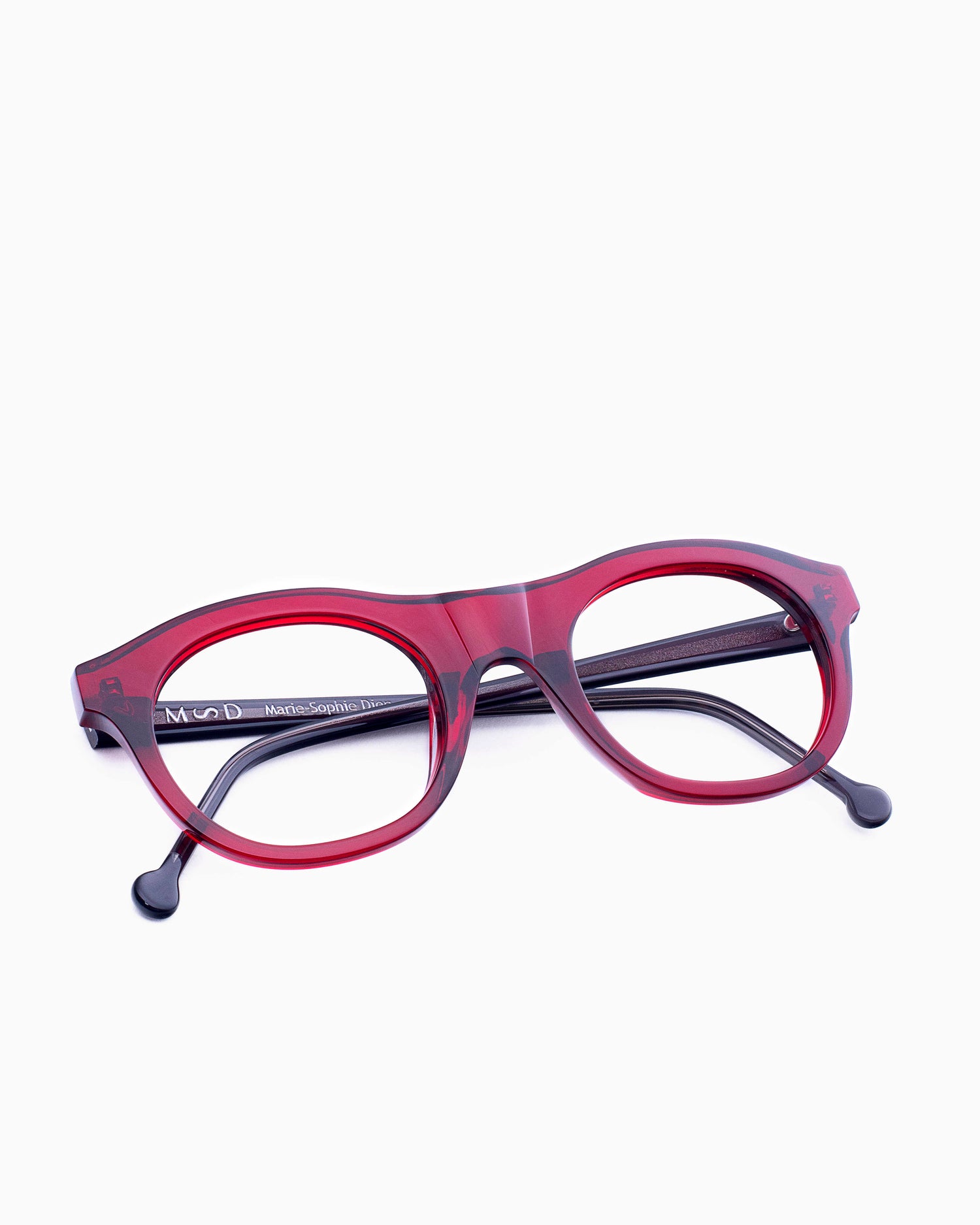 red plastic oval eyeglasses by Marie-Sophie Dion model LEcuyer, front view, lunettes de vue ovale couleur bourgogne