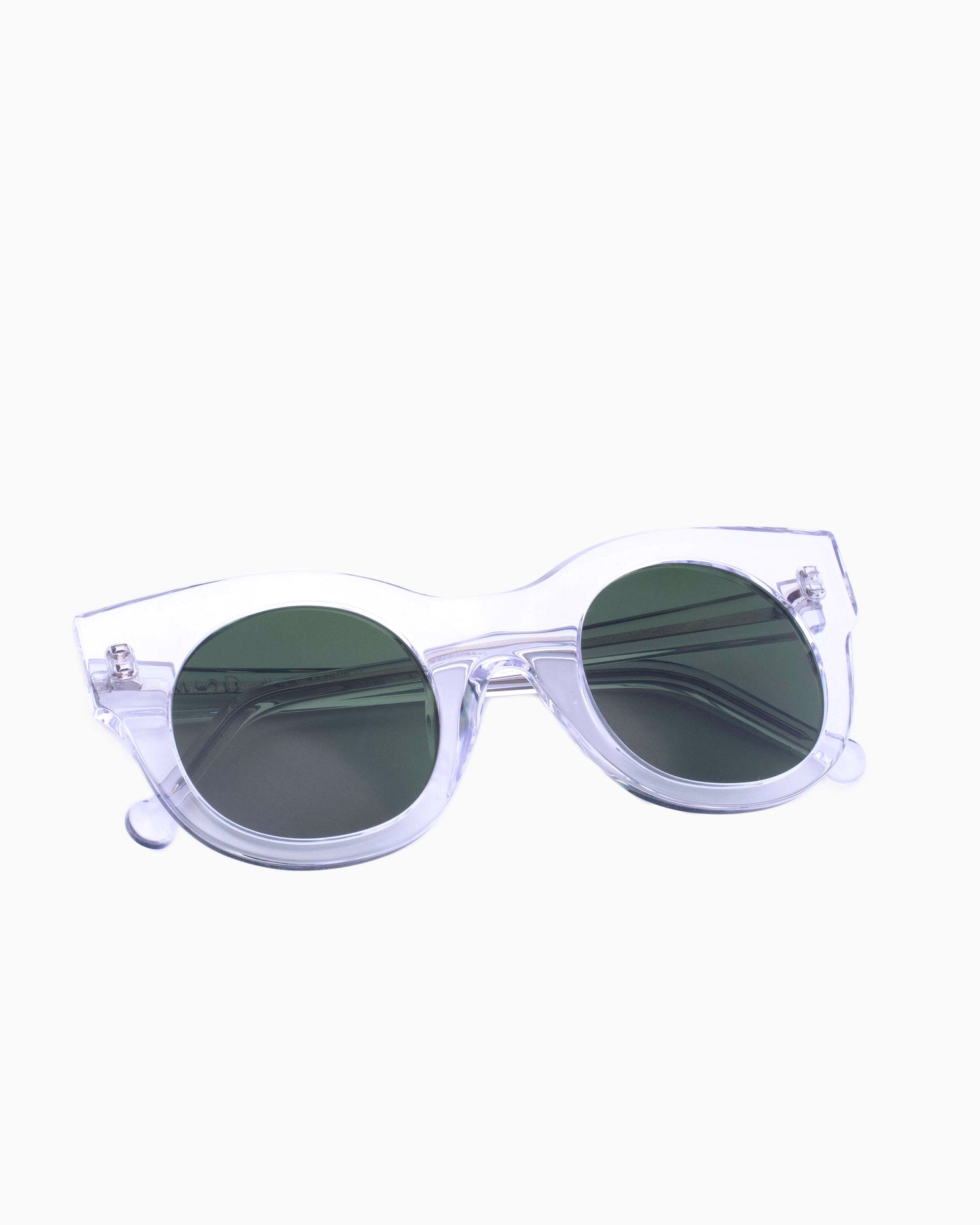 crystal plastic round  sunglassesby Marie-Sophie Dion model BrixiSun, front view, lunettes de vue rond couleur cristal